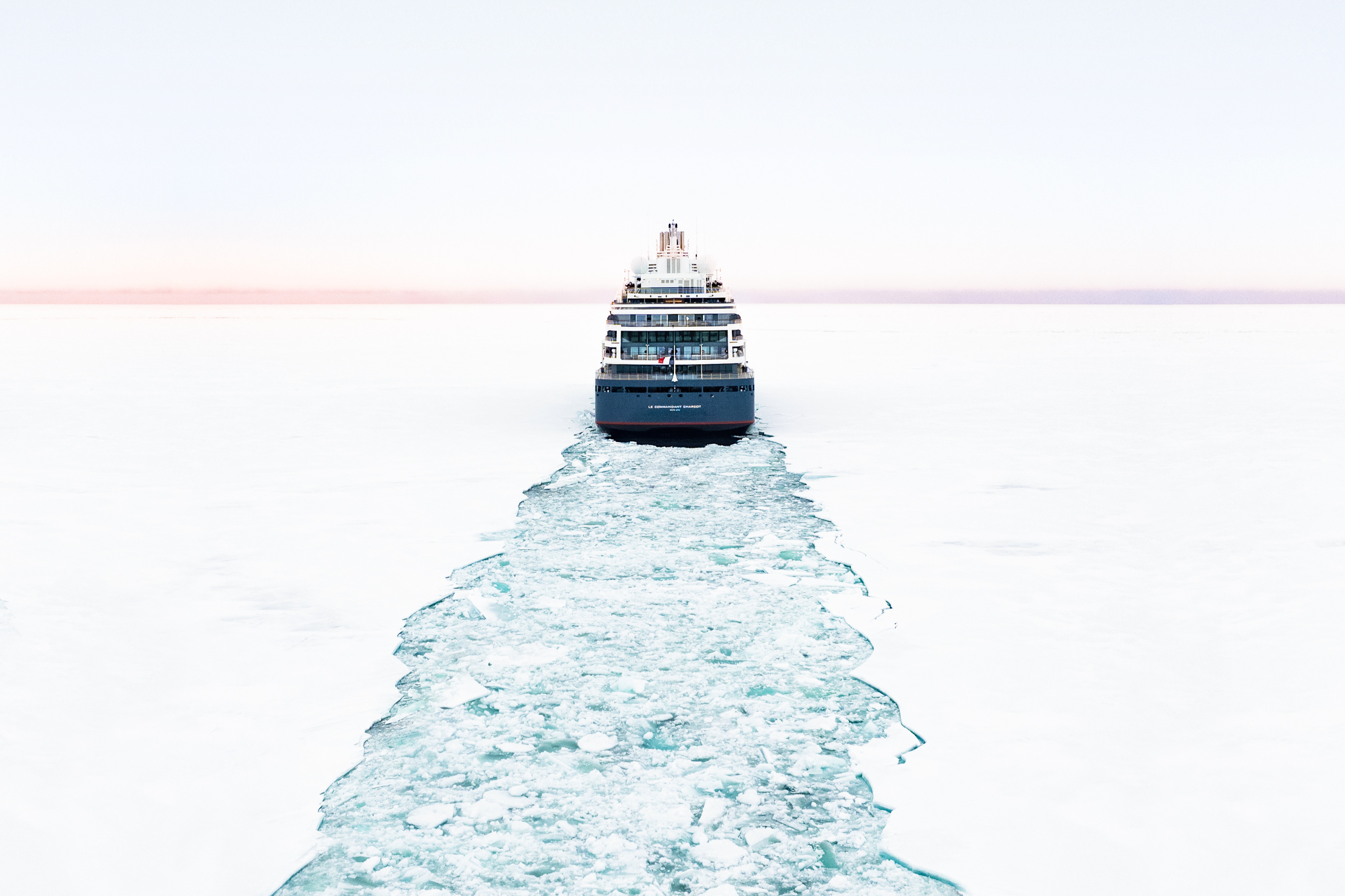 Le Commandant Charcot travelling through polar sea ice