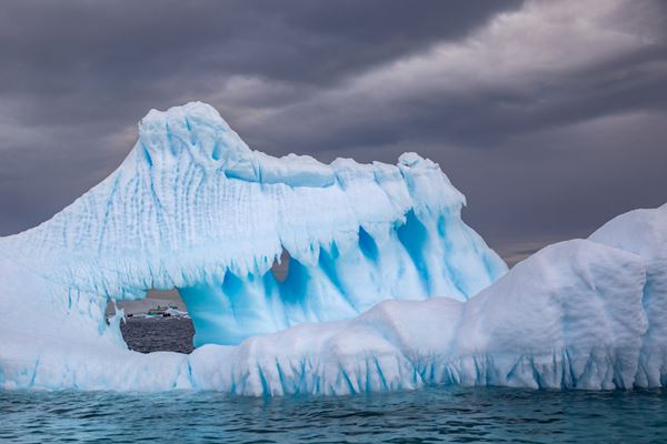 Sculpted blue iceberg near Charcot Island