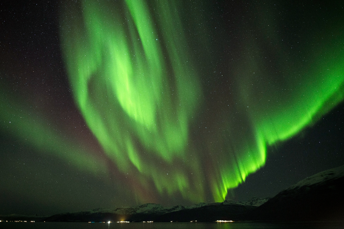 Green northern lights illuminating the sky