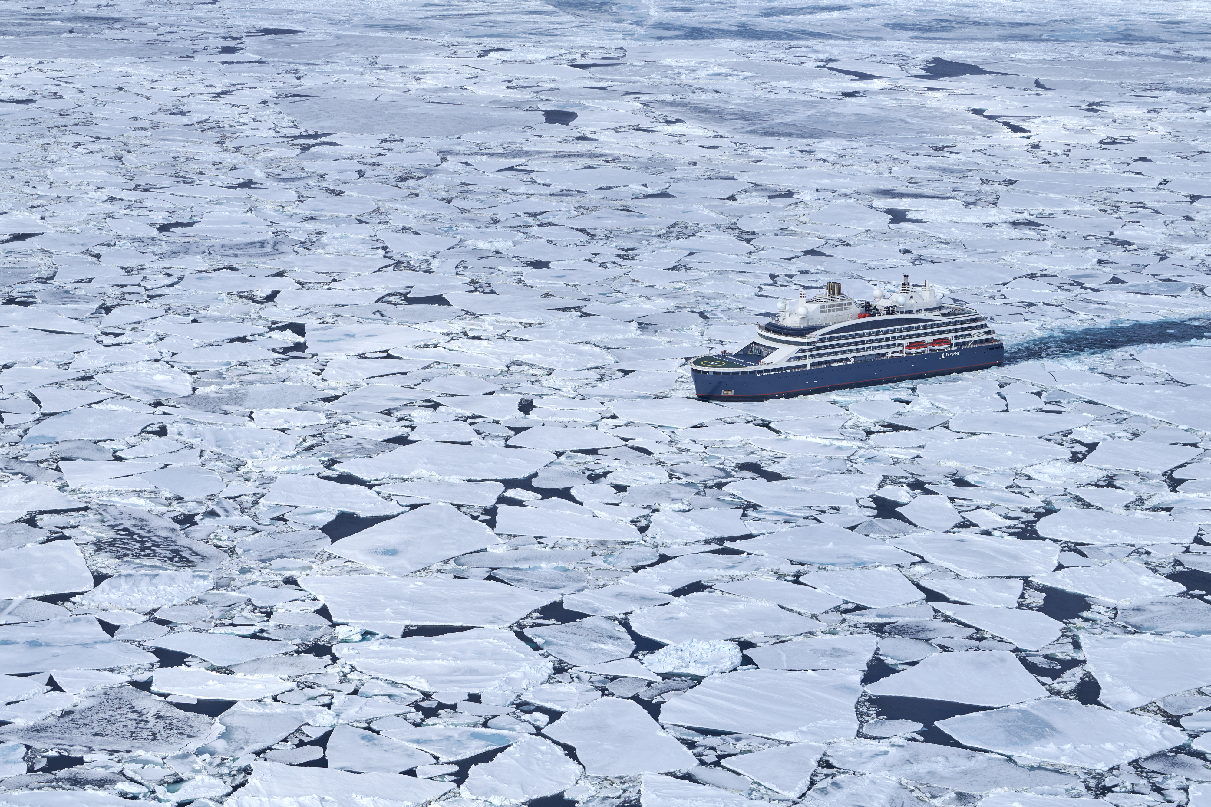 Greenland Commandant Charcot breaks through fractured sea ice by Mike louagie